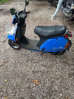 Blue honda aero 80