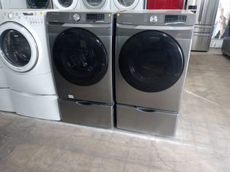 Samsung gray front load washer and dryer set on pedestals - Free delivery