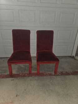 2 red table chairs