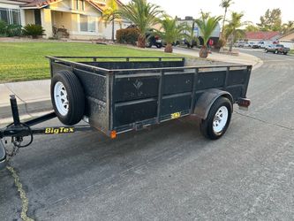 good conditions 2004 big tex utility trailer. Good tires new tail lights. 10'x5'