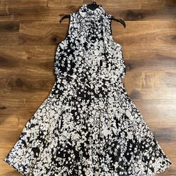 Brand new woman’s Taylor brand black and white colored floral dress up for sale 