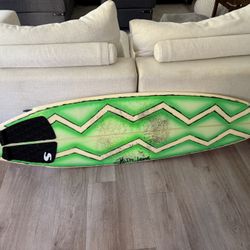 Surfboard: Artistic Green Surfboard – Bold Design, Signed Deck, Used but Solid