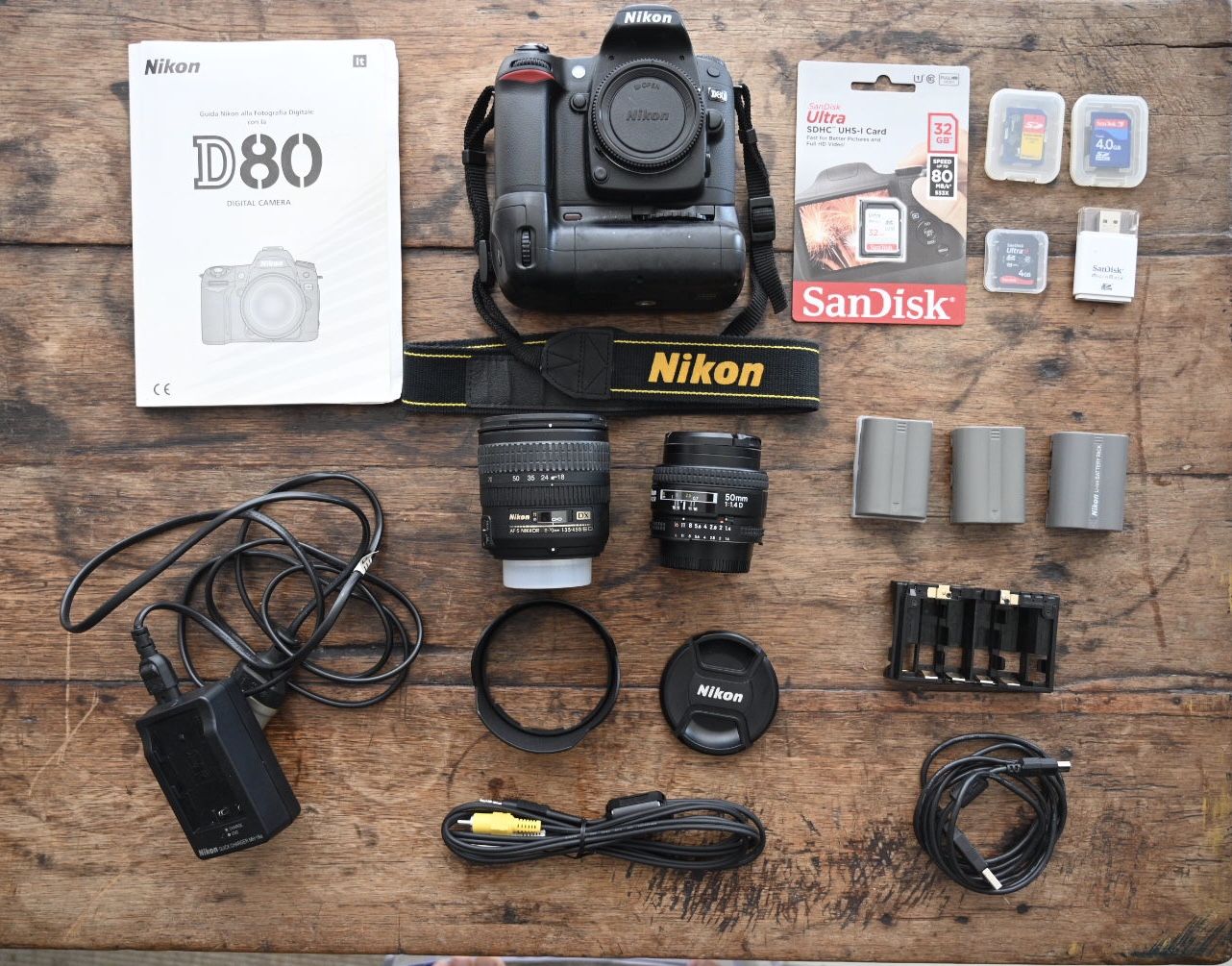 Nikon d80 + lenses 18-70 and 50mm + batteries pack + 3 batteries + remote control + 4 memory cards