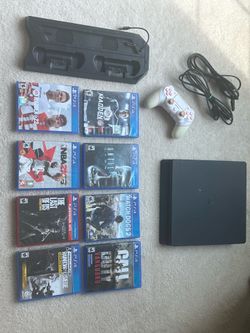 PS4 Slim + 8 Games