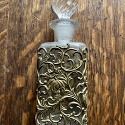 Vintage perfume bottle in Brass filigree with crystal stopper