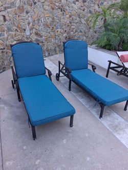 2 Outdoor Poolside Chaise Lounge Chairs with Blue Cushions