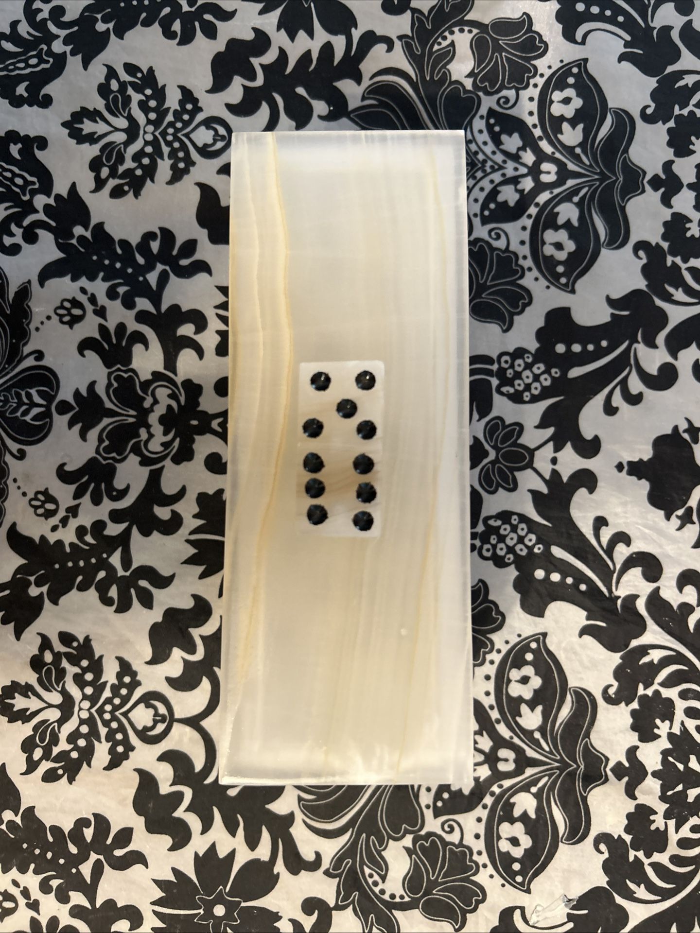 A vintage 28 piece set of domino’s appearing to be Onyx Crystalline