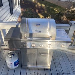 Nexgrill propane gas grill with a side burner.