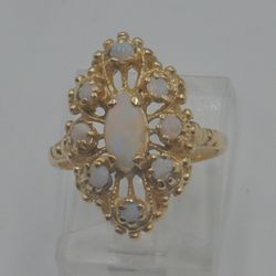 10KT YELLOW GOLD RING SIZE 5.25 3.8 GRAMS WITH OPAL STONES MINT CONDITION. 863950-15. 