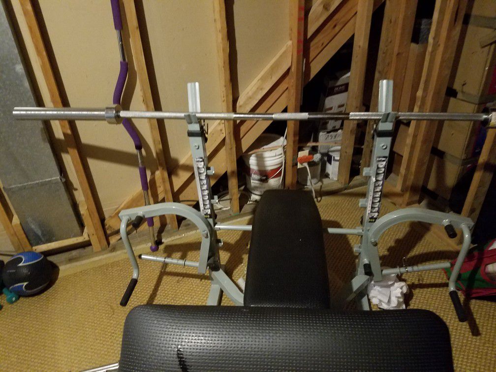 Weight bench with preacher curl attachment