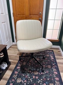Cream Armless Office Chair with Wheels