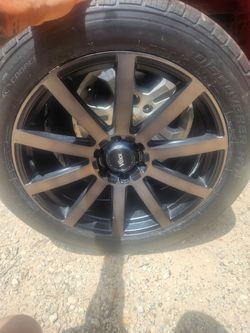 Cooper discovery htp285/45/R 22" tire  and new  voxx  weel  for yukon denali