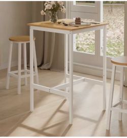 Vasagle bar table I have a white build and a black one not build both new $25 each ( chairs not included