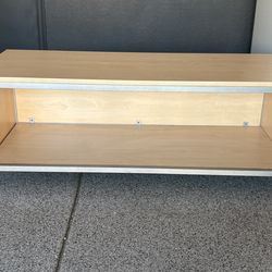 Mobile Storage Bench. Light wood, and metal. On wheels. 23 x 54 inches 19 inches tall. Great quality