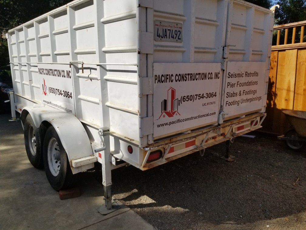 Dumpster trailer by Carson 14,000 lb, loading ramps, 12' long x 4 feet high walls, heavy duty Jacks, tire, loading ramps