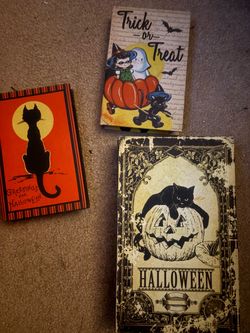 vintage Halloween storage books and decor