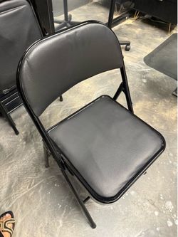 7 Black Folding Chairs with Padded Seats