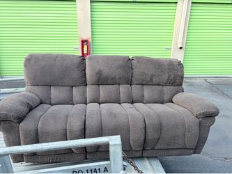 Brown Plush Reclining Loveseat with Console & Cup Holders
