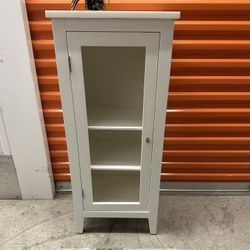 Pottery Barn Single Door Contemporary Bathroom Freestanding Cabinet with 2 Shelves  Single Glass Door White Marble Counter Top. 39 H x 14 D x 26 W