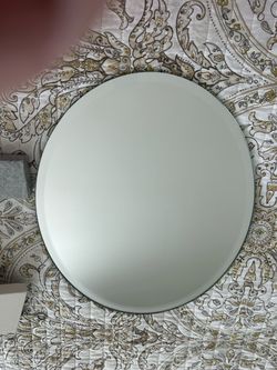 Never Used Oval Frameless Beveled “Charger” Mirror