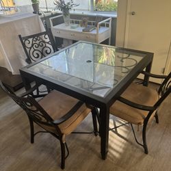 Patio Set and 4 Chairs