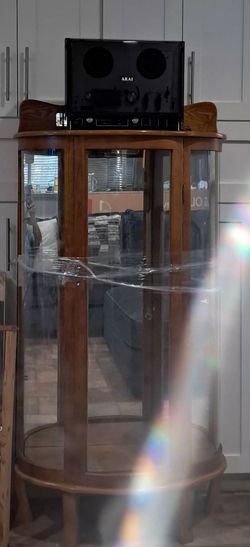 Small 3 shelve cabinet  with light mirror on back  has key