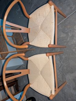 Two wood cloth chairs