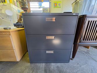 HON 3 drawer filing cabinet in dark Grey
36"w x 19.25"d x 41"h
Has key code to order new keys