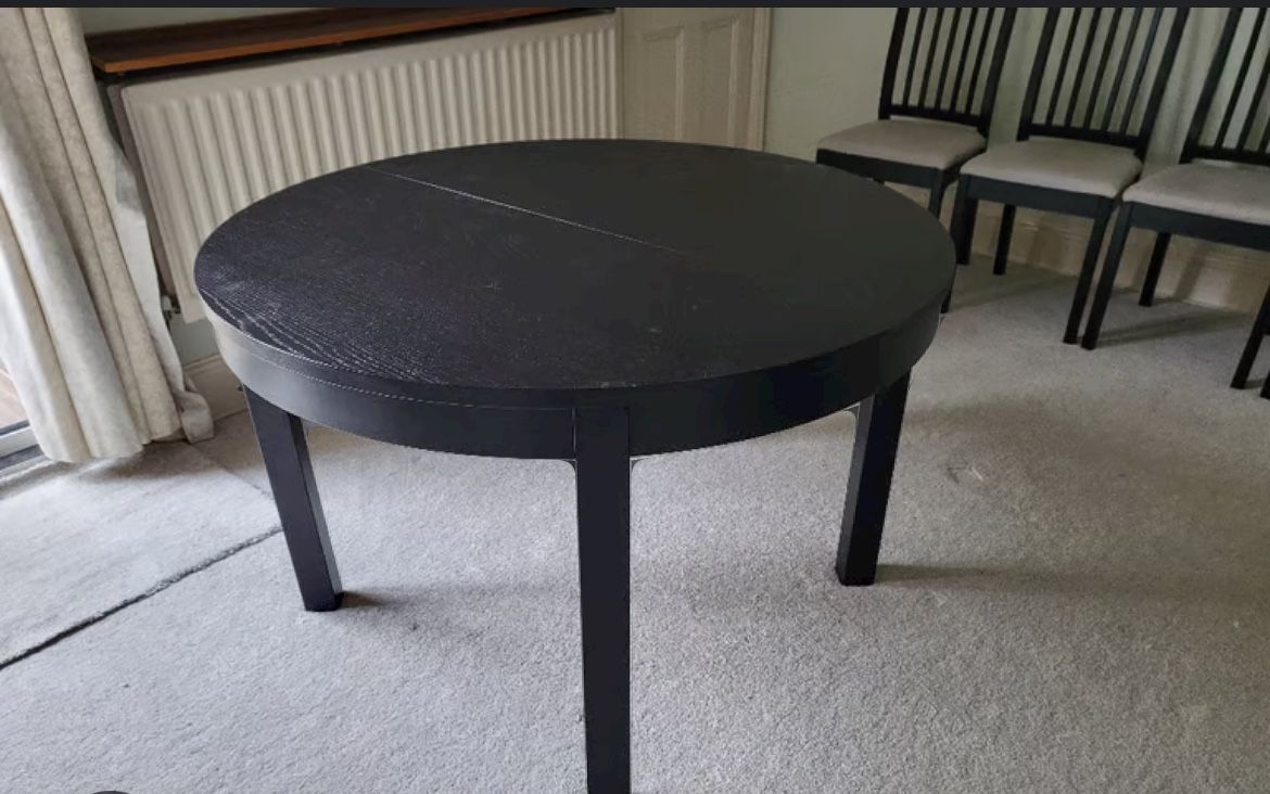 Gently used Black Dining table + 4 Chairs