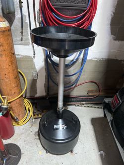 Movable oil drain