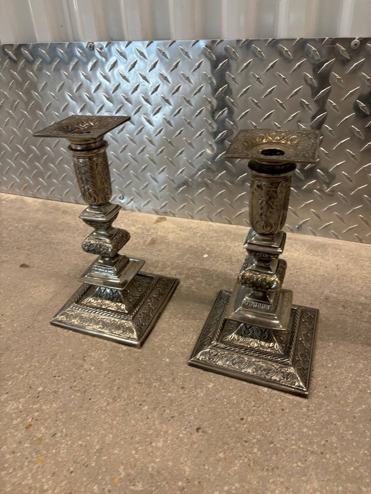 Castilian Imports Made In India Vintage Silver Candlesticks 10 inches high. $75 for the pair.