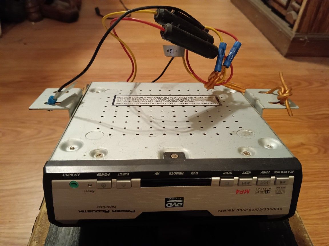 Power Acoustik(in dash D.V.D. player+wires)