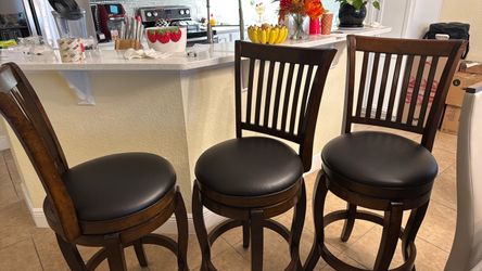 3 high bar stools.