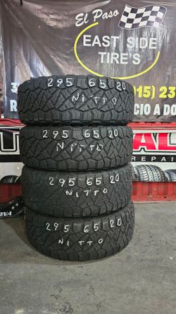 295 65 20 SET4 NITTO A/T INSTALADAS POR 480 Dlls.