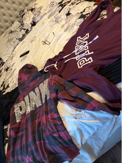 2 woman’s pink sweaters good condition size medium both for 20