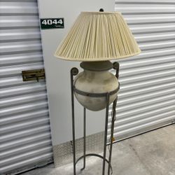 Iron and ceramic clay pot standing lamp.., 61” high , 20” wide , $50