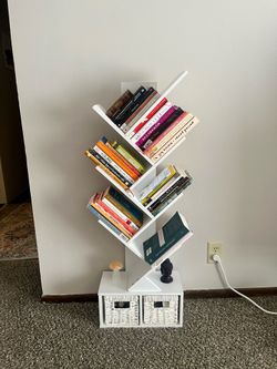 Staggered book shelf white wood