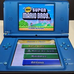 NINTENDO DSI XL COMPLETE WITH STYLUS AND CHARGER