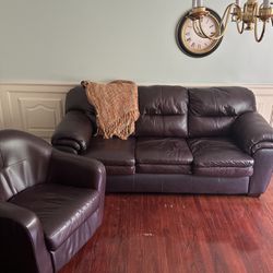 Leather sleep, sofa, couch, and Two Swirl Chairs 