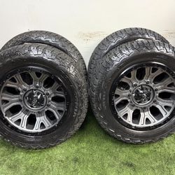 20x9 fuel wheels wrapped in petegonia 275/60r20 tires same as 33s.