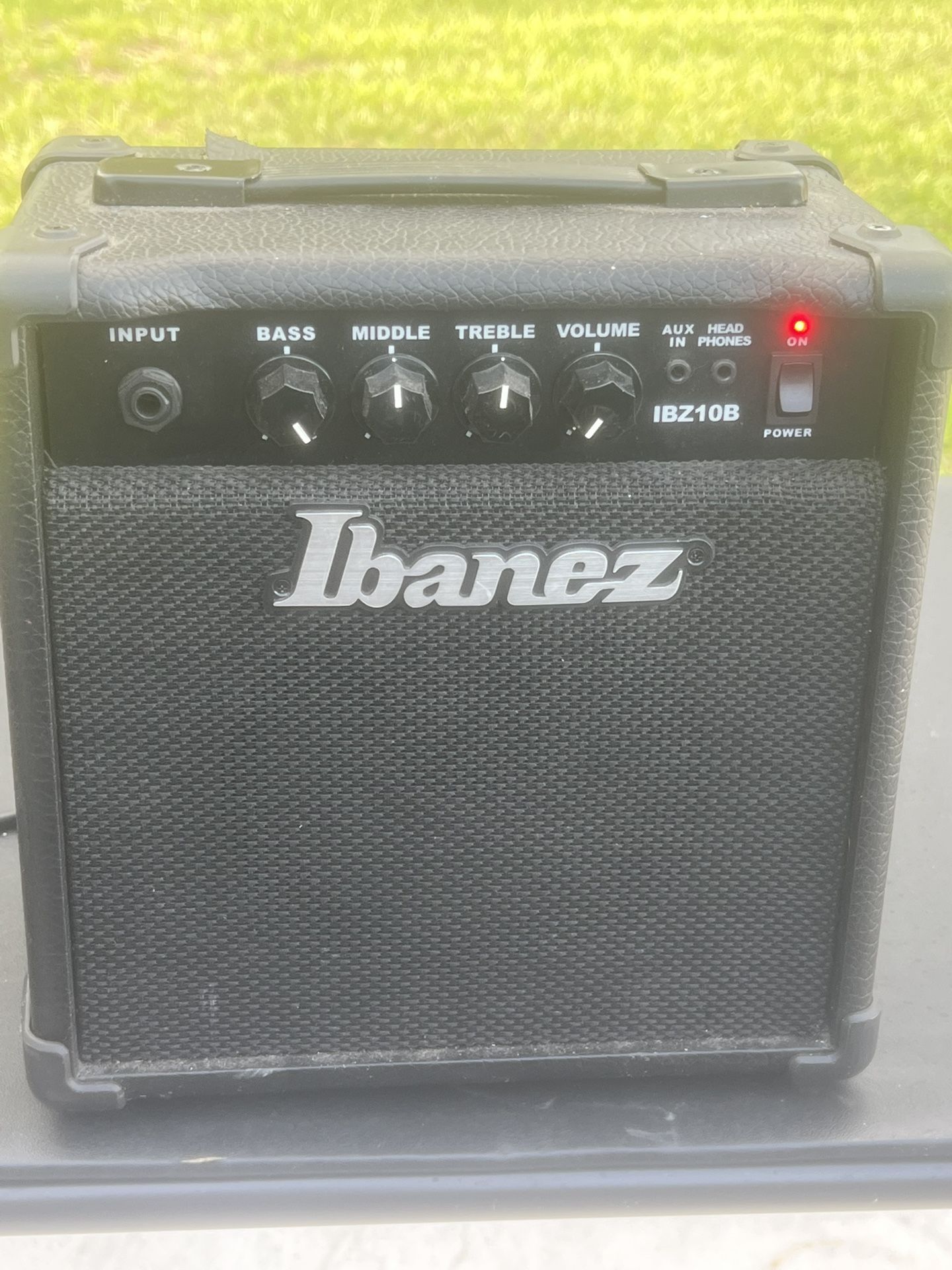 Ibanez Guitar Amplifier Tested Working IBZ 10 B. Used in good condition with a couple of cuts to the lining.