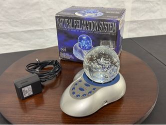 Sleep sound machine with light therapy