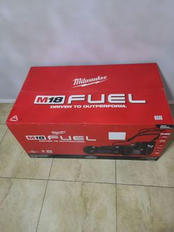 Milwaukee M18 lawn mower with 2- 12ah forge batteries and double dual charger new