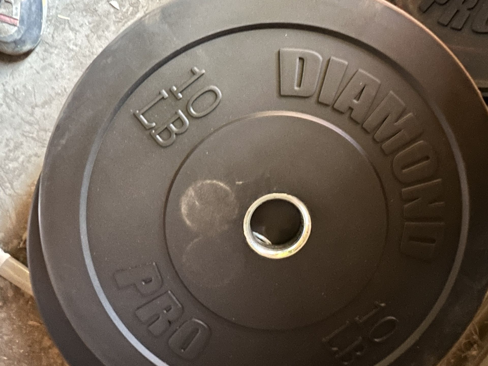 Weight Lifting Plates . Rubber Bumper