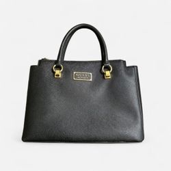 Black leather guess handbag with gold hardware including wallet and strap