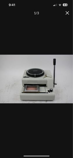 Credit card embossing machine