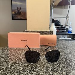 Miu miu Glasses