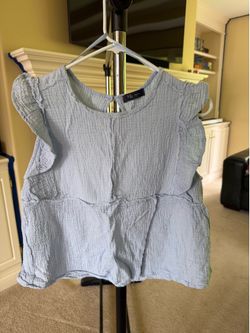 Light blue ruffle sleeve top