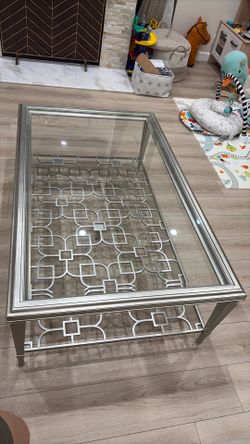 Caracole style coffee table, silver leaf champagne, 56”L 34”W 18” H