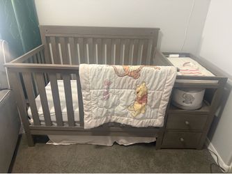 Crib with changing table
